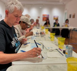 Blackwater Artist League member Ann Bryant enjoys a watercolor class.